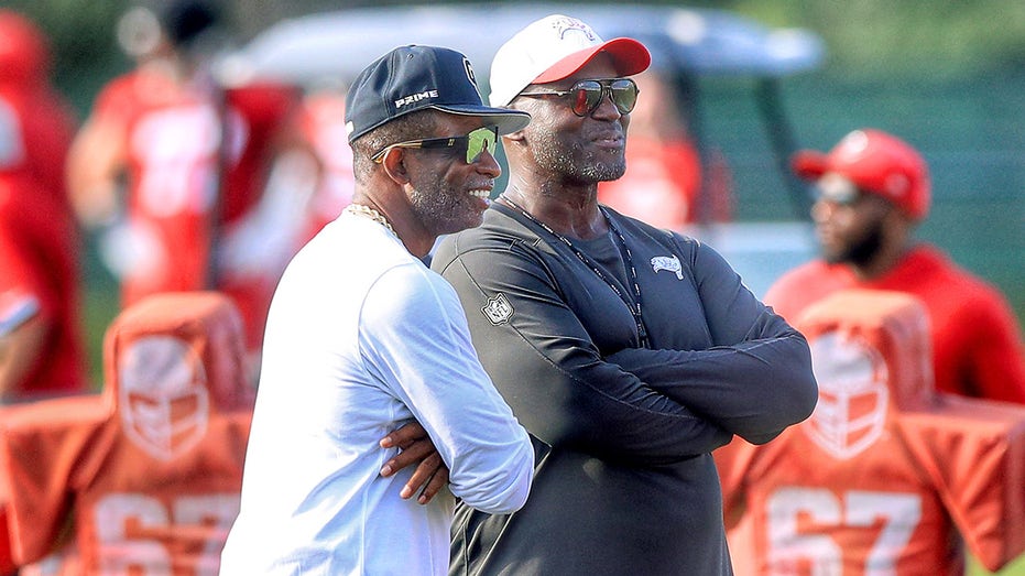 deion-sanders-makes-surprise-visit-at-buccaneers-training-camp-to-see-son-shilo-compete-for-roster-spot