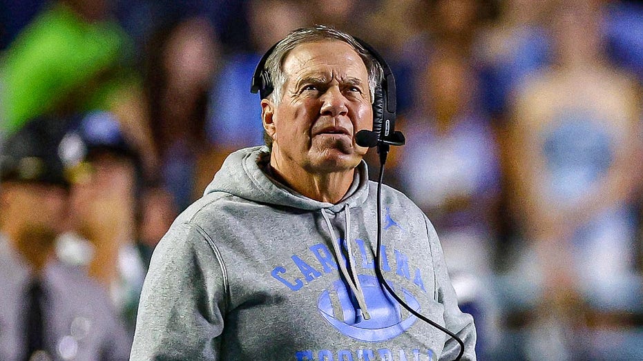 jordon-hudson-enjoys-bill-belichick’s-unc-debut-in-suite-with-randy-moss-as-celebrities-flock-to-chapel-hill