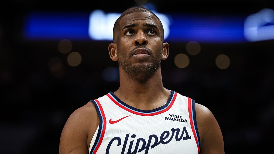 chris-paul,-clippers-finally-part-ways-in-three-team-trade-involving-raptors-and-nets