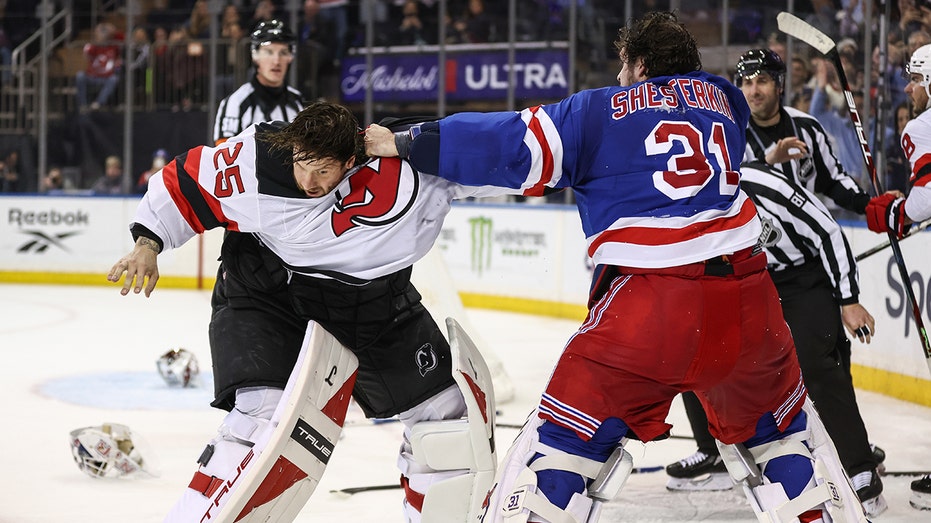 rangers,-devils-goalies-battle-in-wild-fight-during-rivalry-matchup