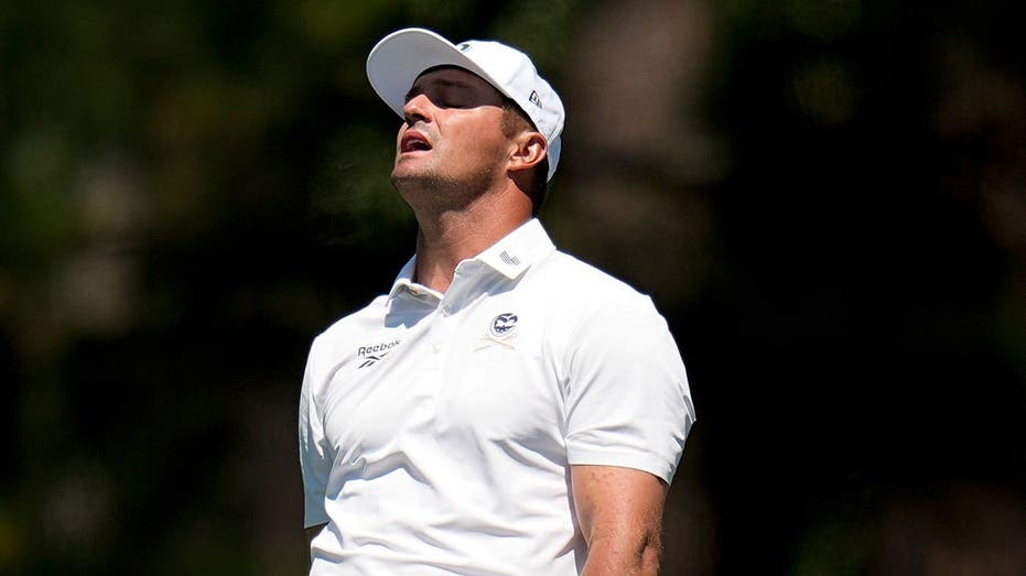 bryson-dechambeau-implodes-on-18th-hole-at-the-masters-with-triple-bogey-to-miss-the-cut